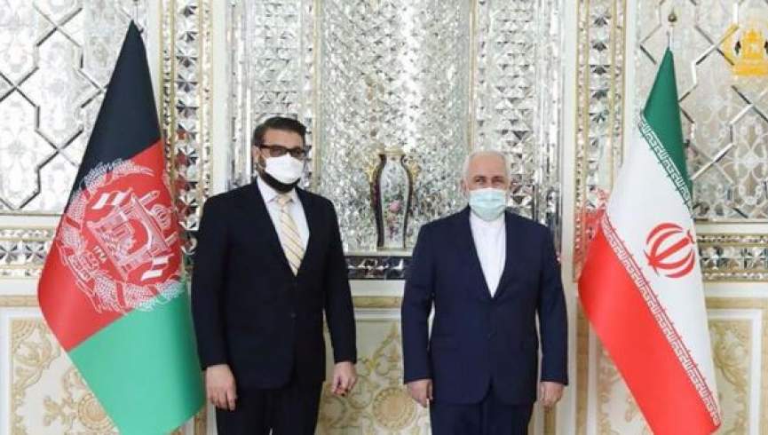 مشاور امنیت ملی افغانستان با وزیر خارجه ایران دیدار کرد