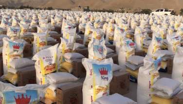 توزیع مواد غذایی برای 900 خانواده نیاز‌مند در بادغیس توسط یک نهاد خیریه